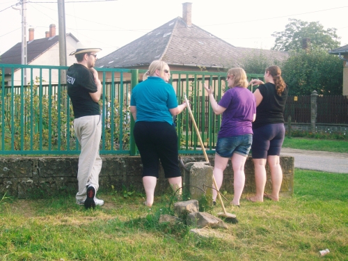 Ruth and her team of girls painting the railings, of course hubby looks on