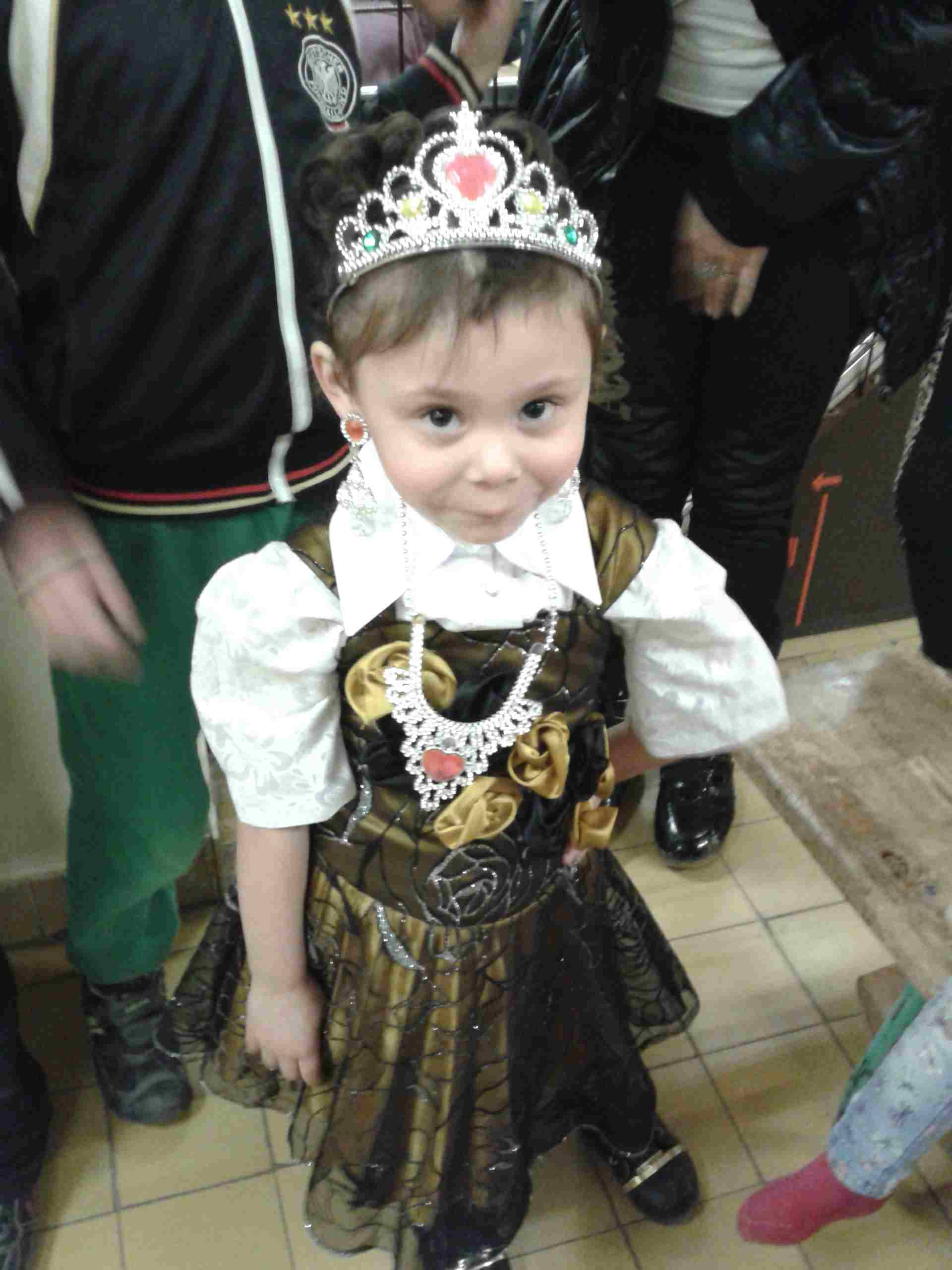 This little girl of 3 years old, is Praising The
              Lord, and so happy to receive her Coronet of Glory from
              friends in UK
