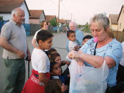 This Betty Price , giving toys, sweets and gifts to the children
