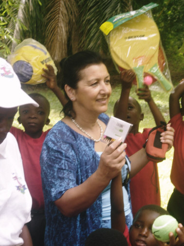 Melanie  giving out toys in Ngonga jungle area