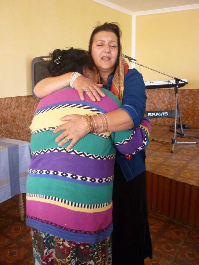 Melanie Giving Ulunka a big hug from Jesus, we all need one